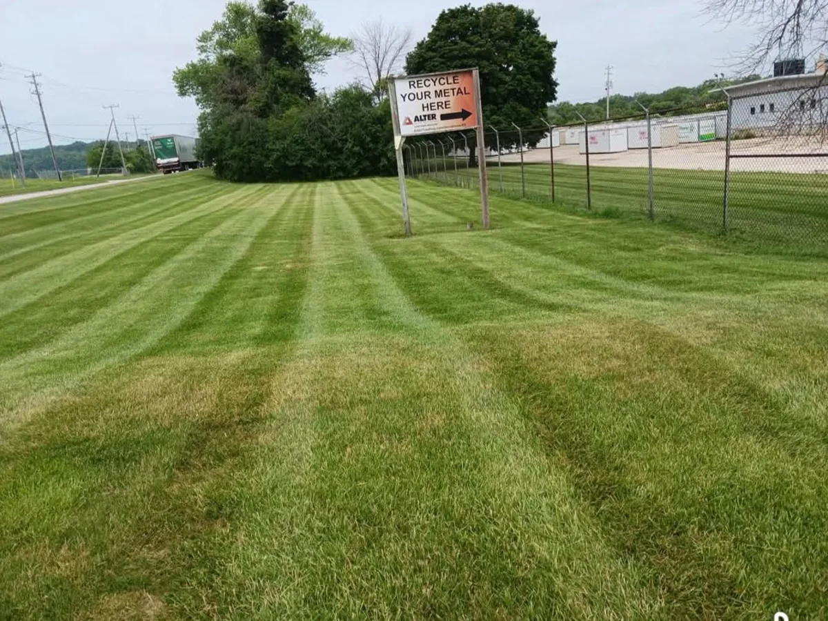 Striped commercial lawn mowing